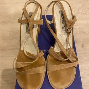 Nude colored, open toe, strap sandal with heels